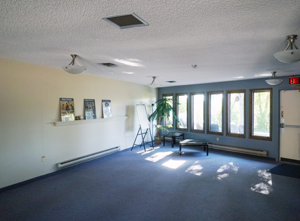 View of an open and spacious meeting room at St. Charles Retreat Centre.